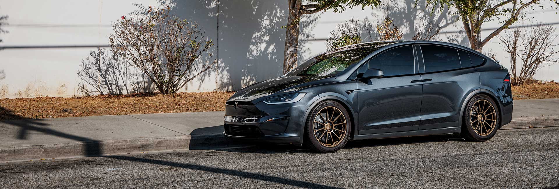 Tesla-Model-X-Stealth-Grey-UP-Forged-UP-03-Satin-Bronze-Wheels-UP-Lowering-Brackets-Big-Brake-Kit-Unplugged-Performance-Homepage-Slider